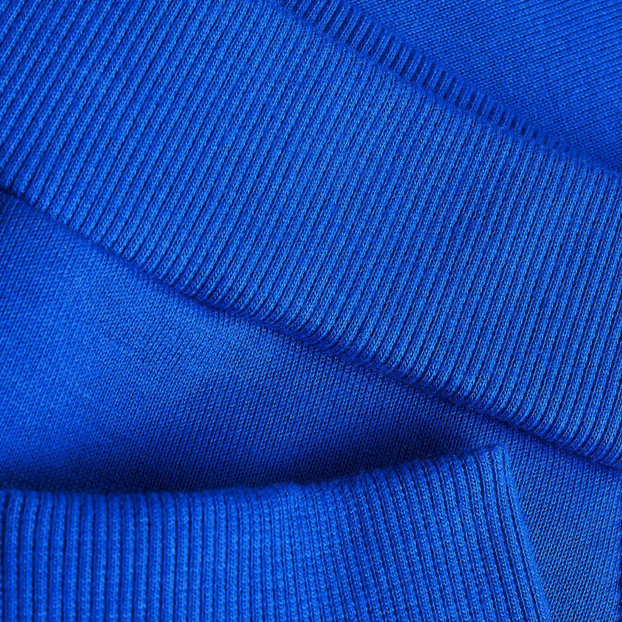 Niebieskie spodnie dresowe z meszkiem Junior