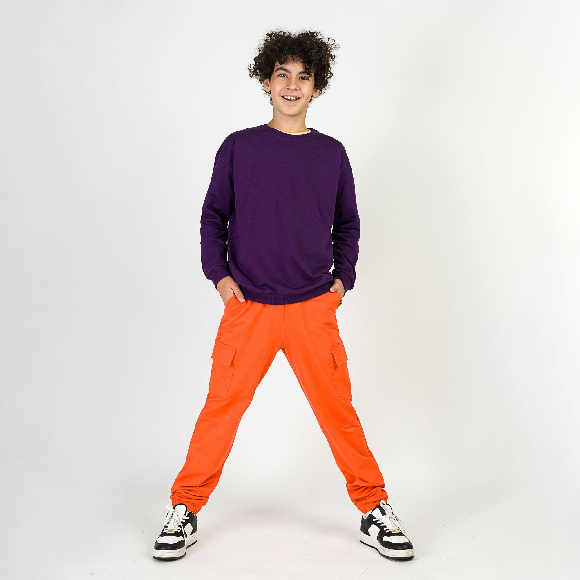 Pomarańczowe spodnie bojówki Junior