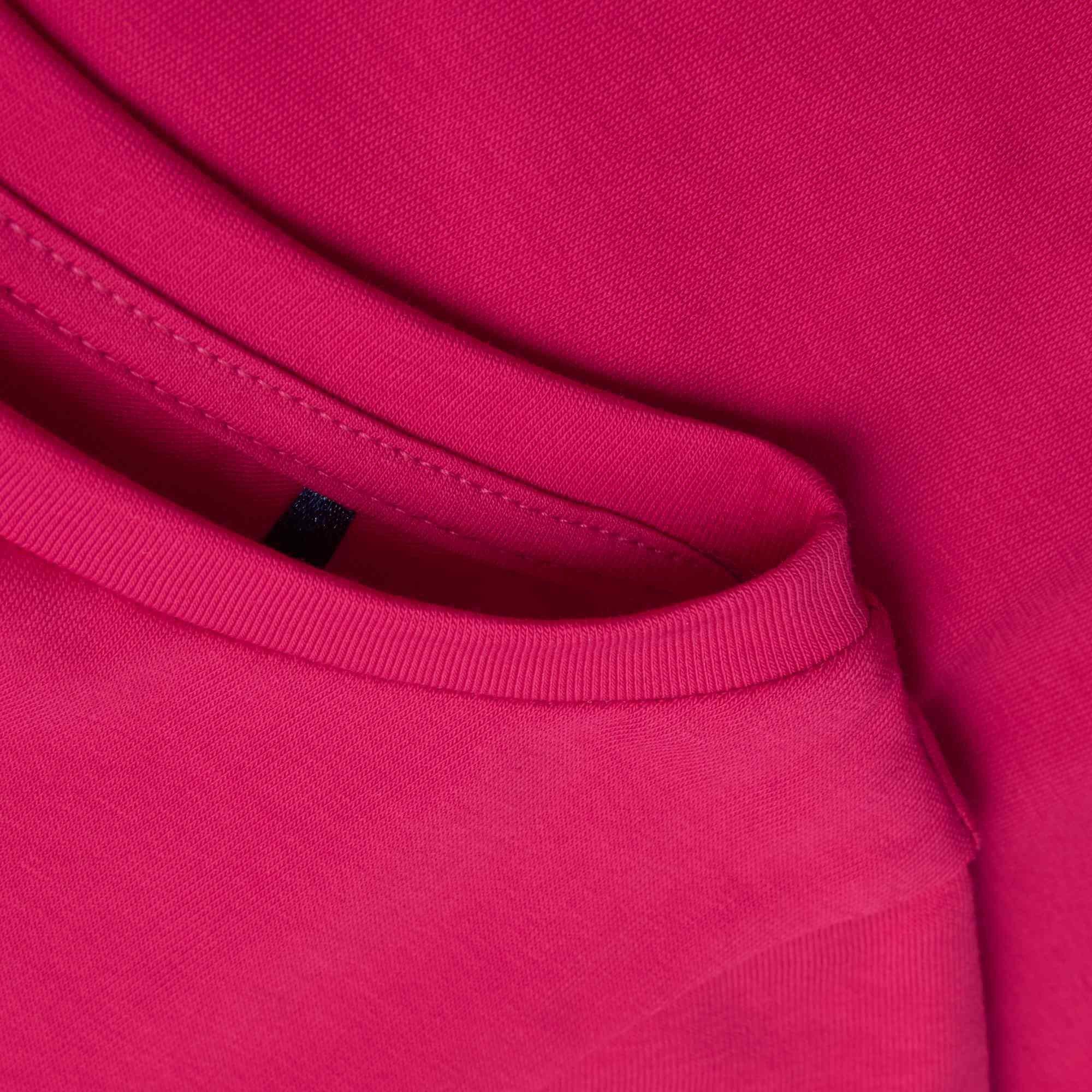 Różowa bluzka z falbanką