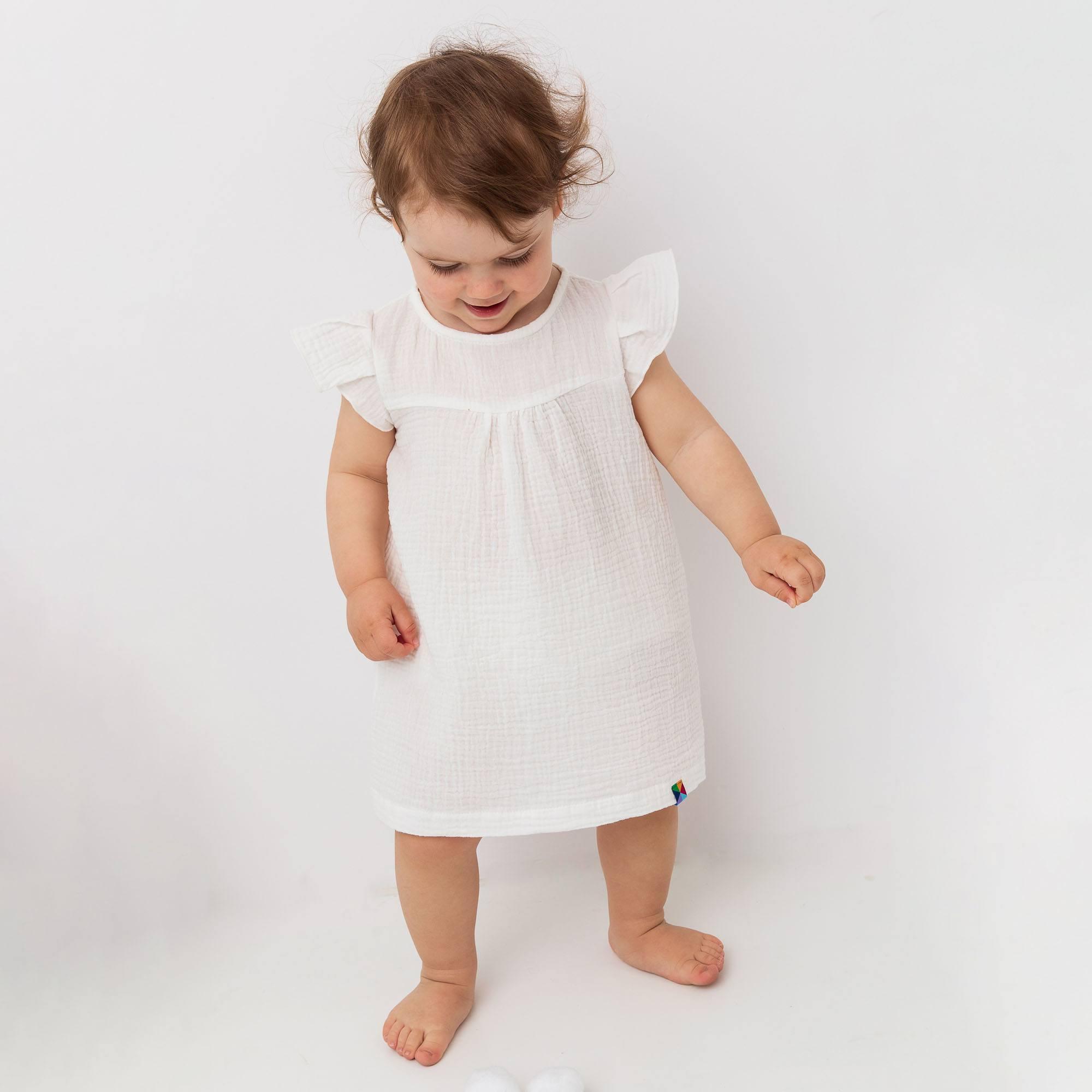 Biała sukienka muślinowa niemowlęca