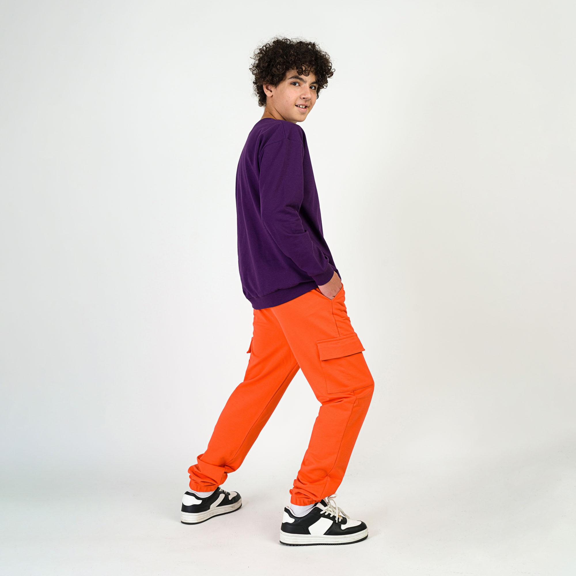 Pomarańczowe spodnie bojówki Junior
