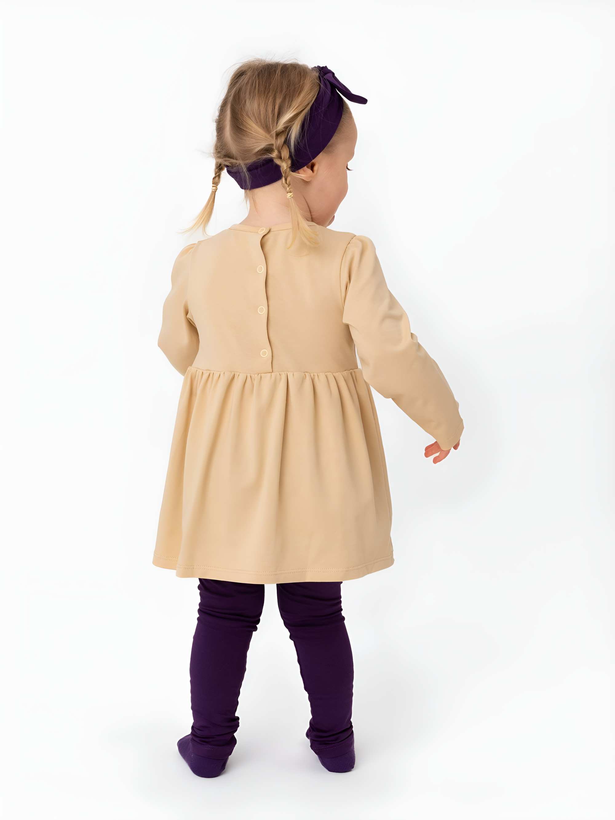 Beige long sleeve bodysuit dress