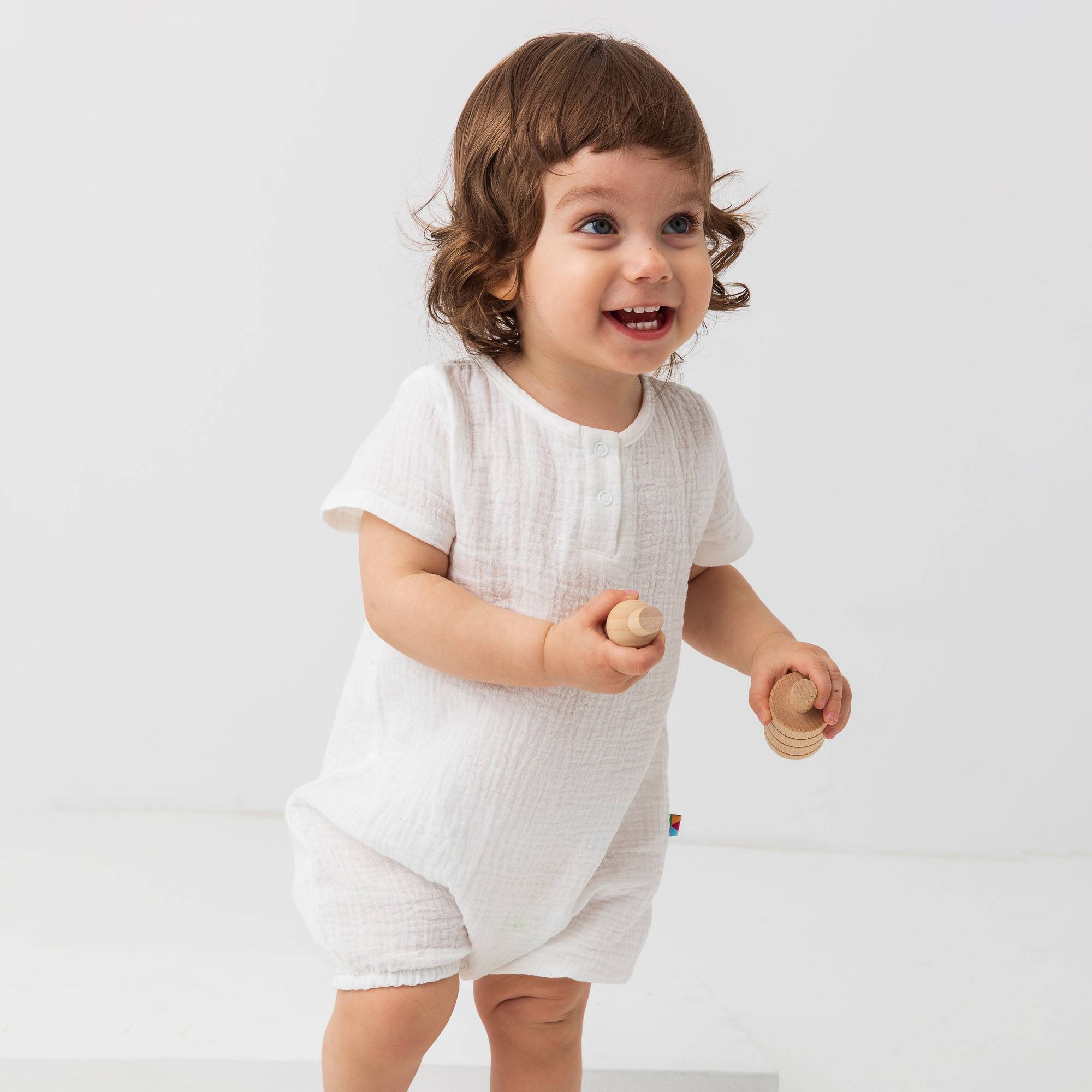 Biały rampers muślinowy