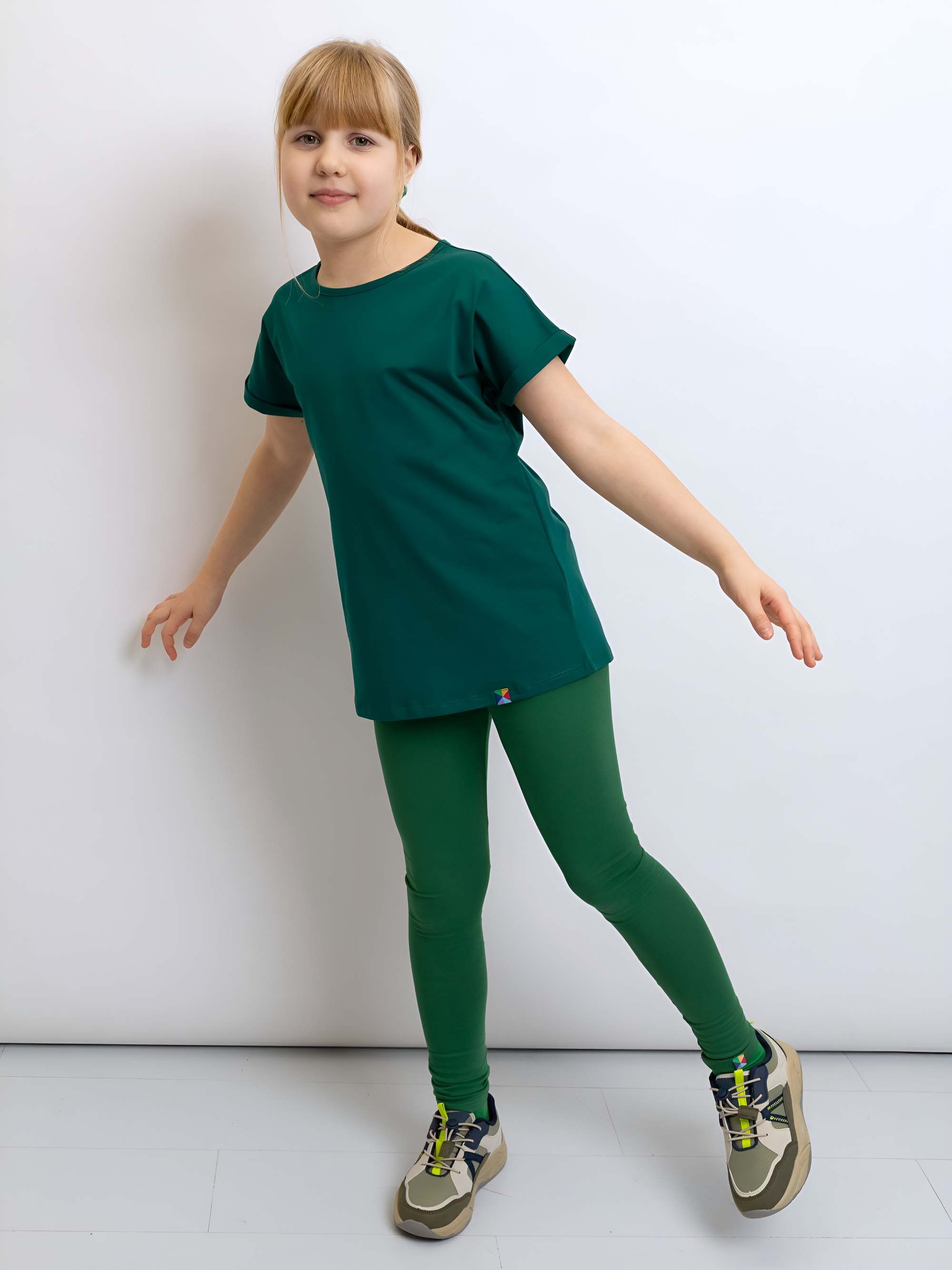 Ciemnozielone legginsy