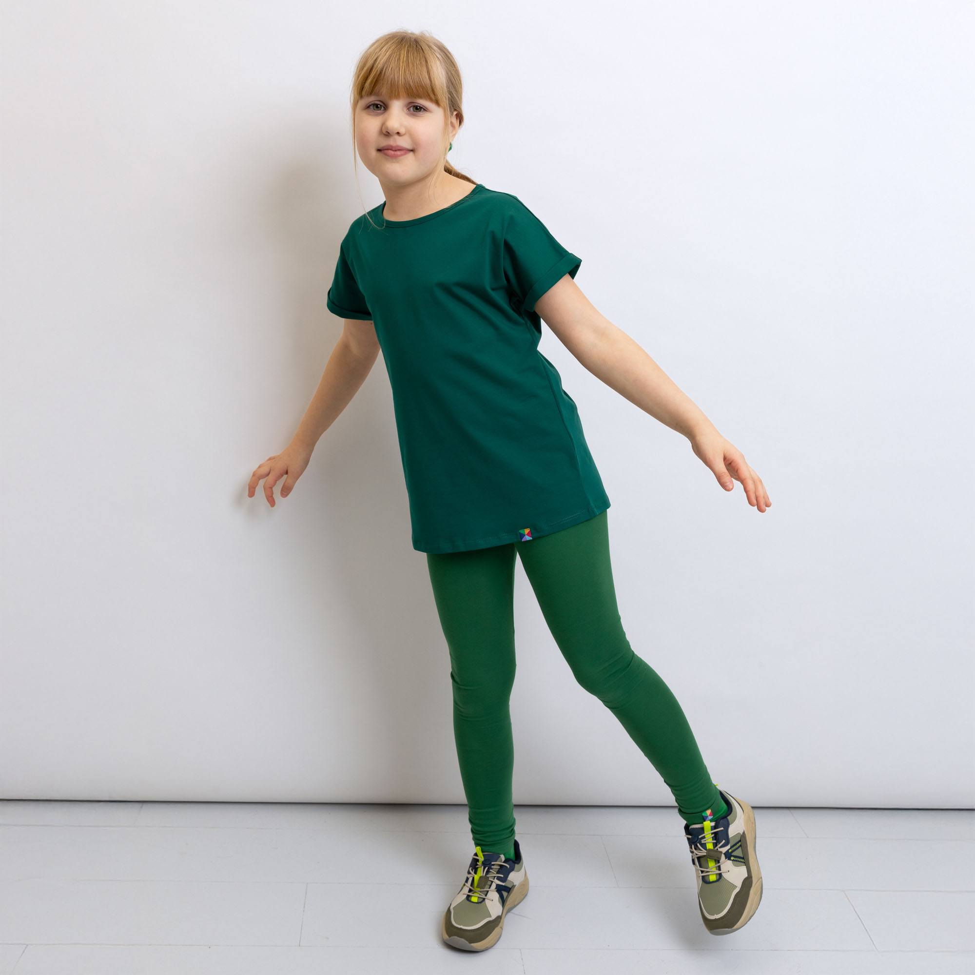 Ciemnozielone legginsy