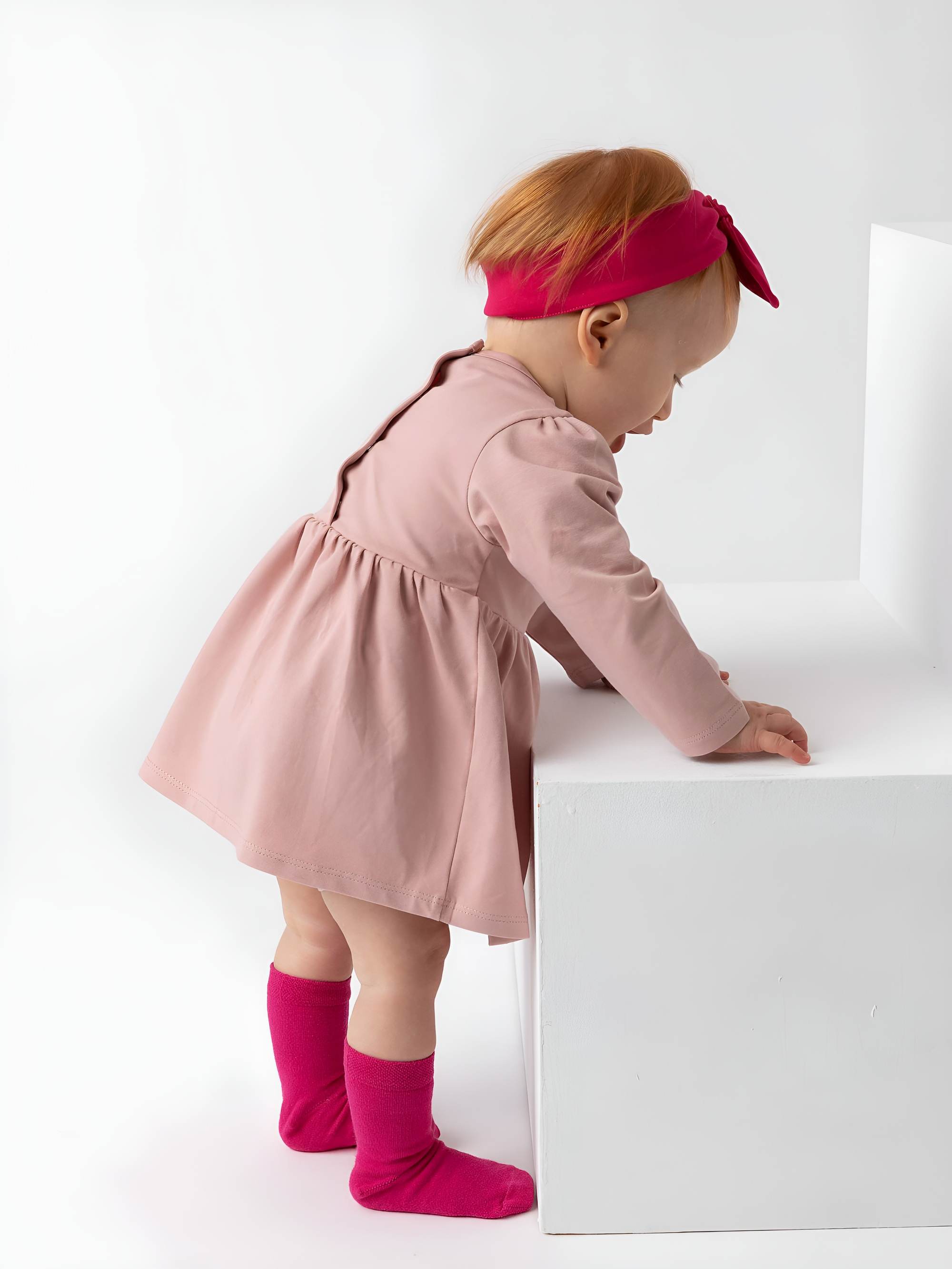 Powder pink long sleeve bodysuit dress