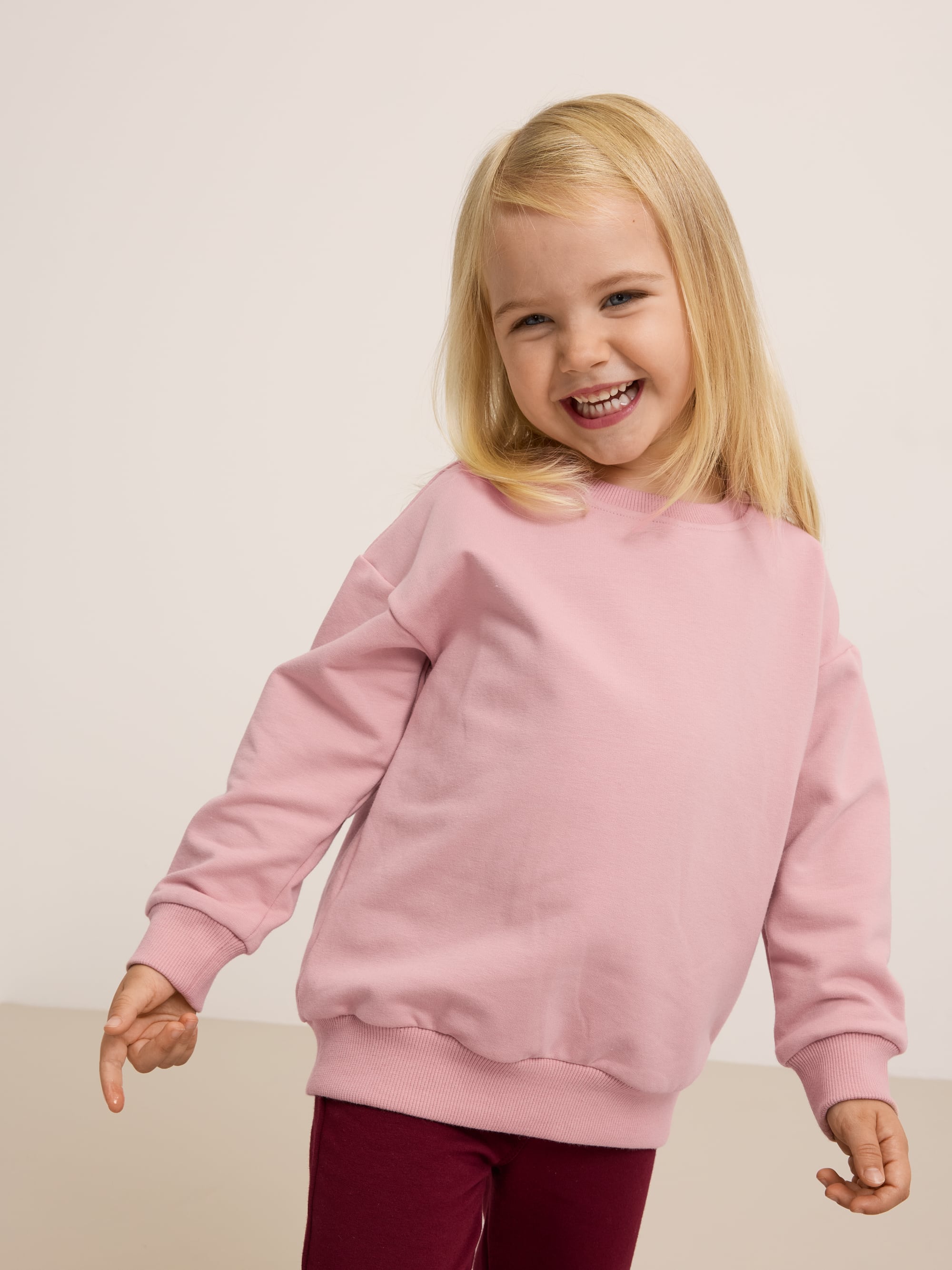 Powder pink fleece-lined sweatshirt