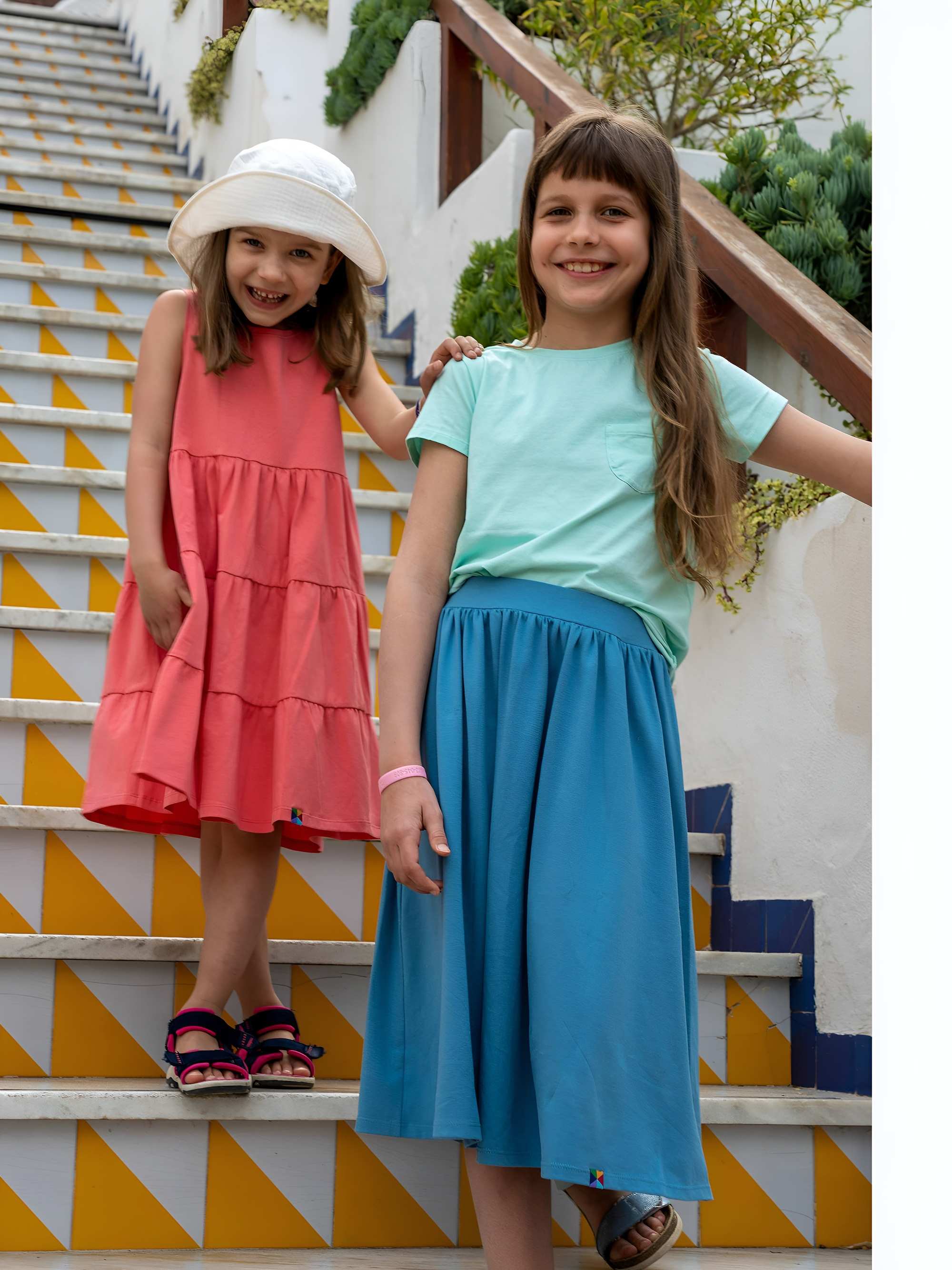 Miętowy T-shirt z kieszonką Junior