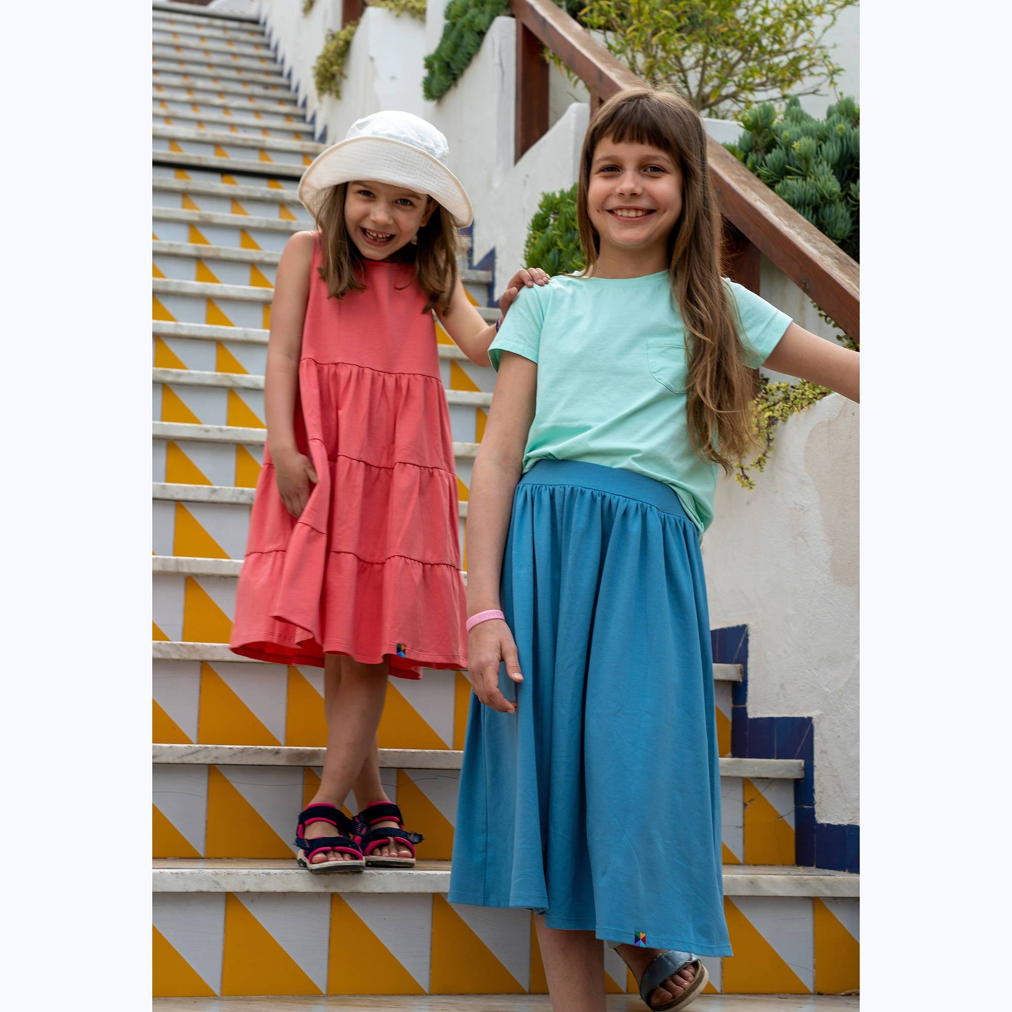 Miętowy T-shirt z kieszonką Junior