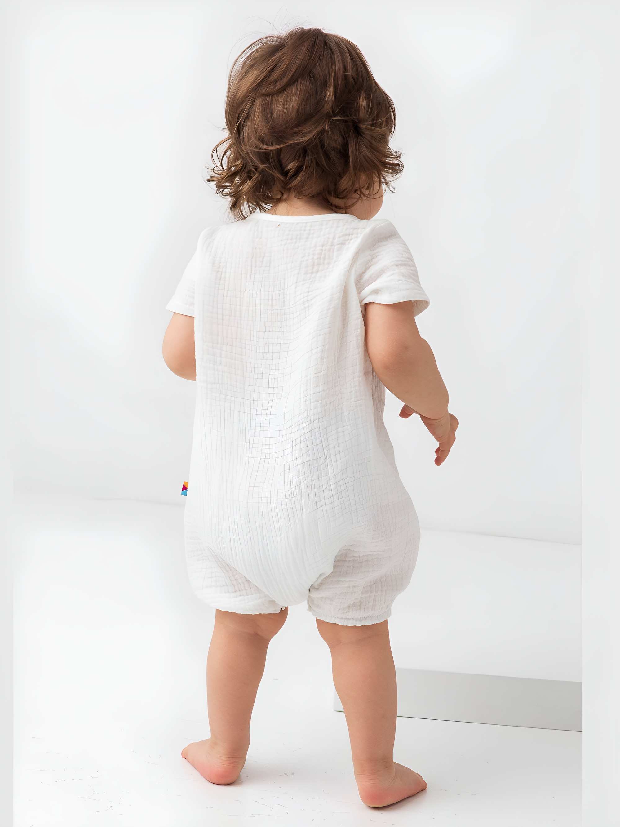 White muslin romper Baby