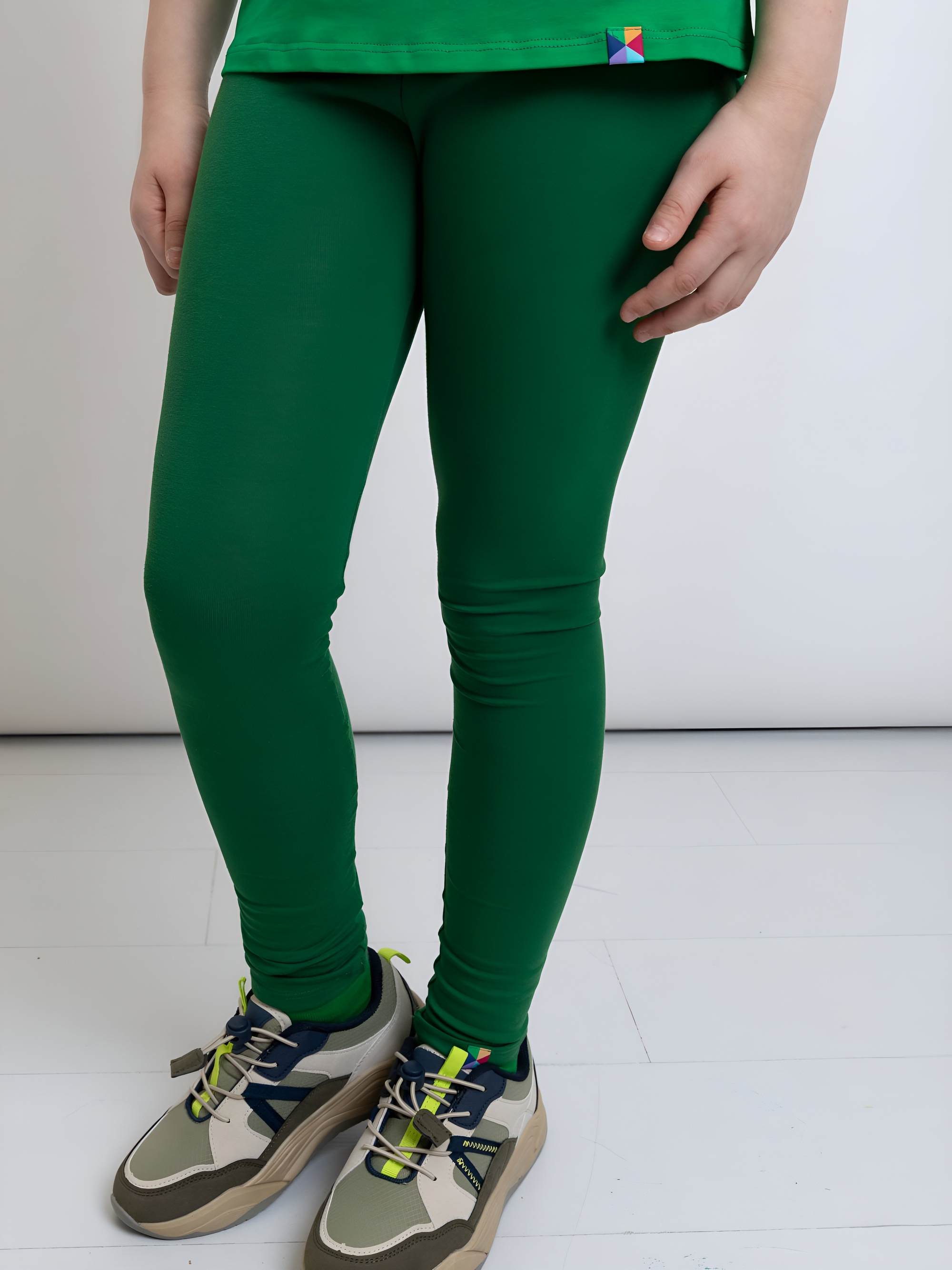 Ciemnozielone legginsy