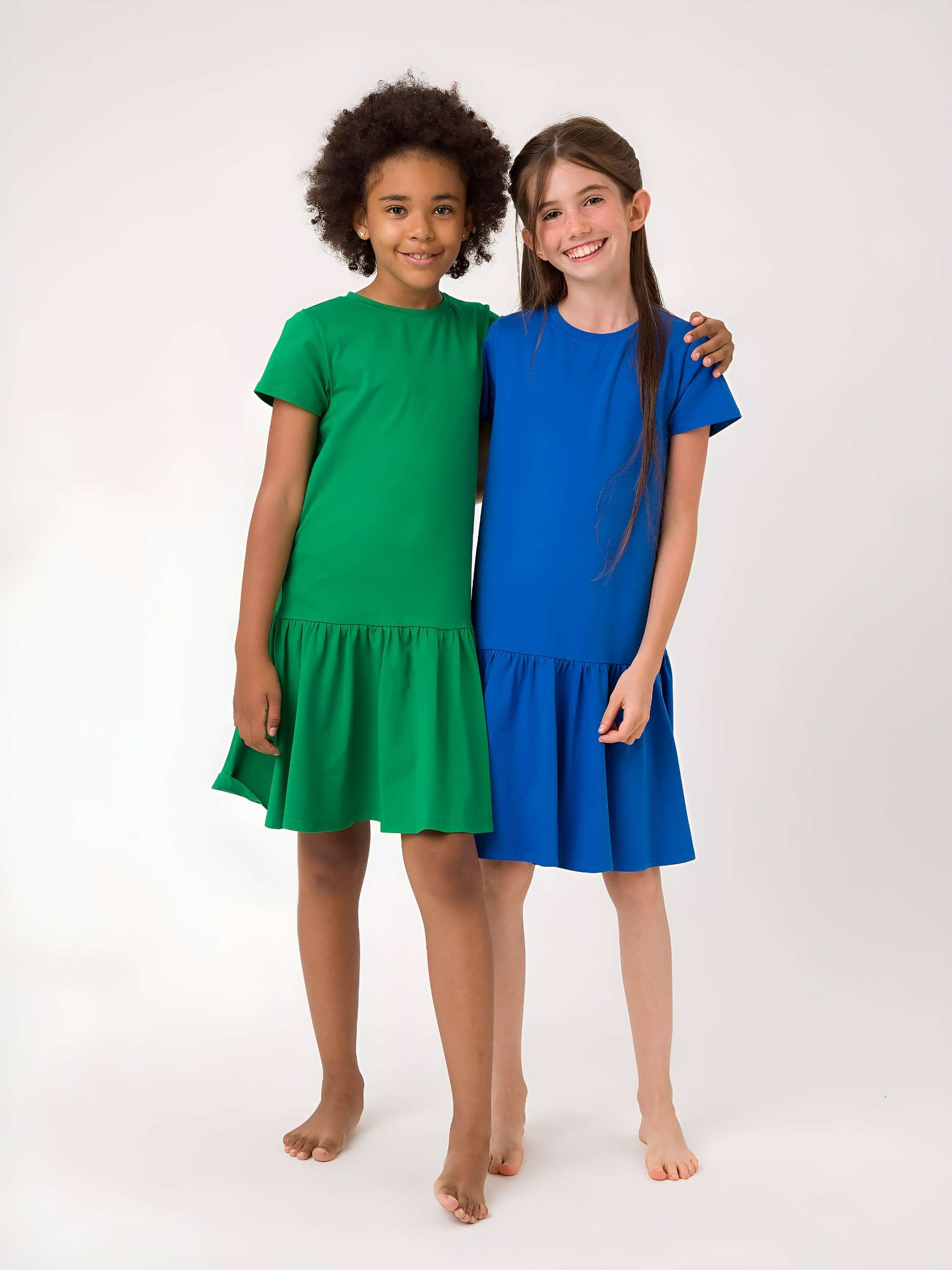 Niebieska sukienka z falbanką Junior