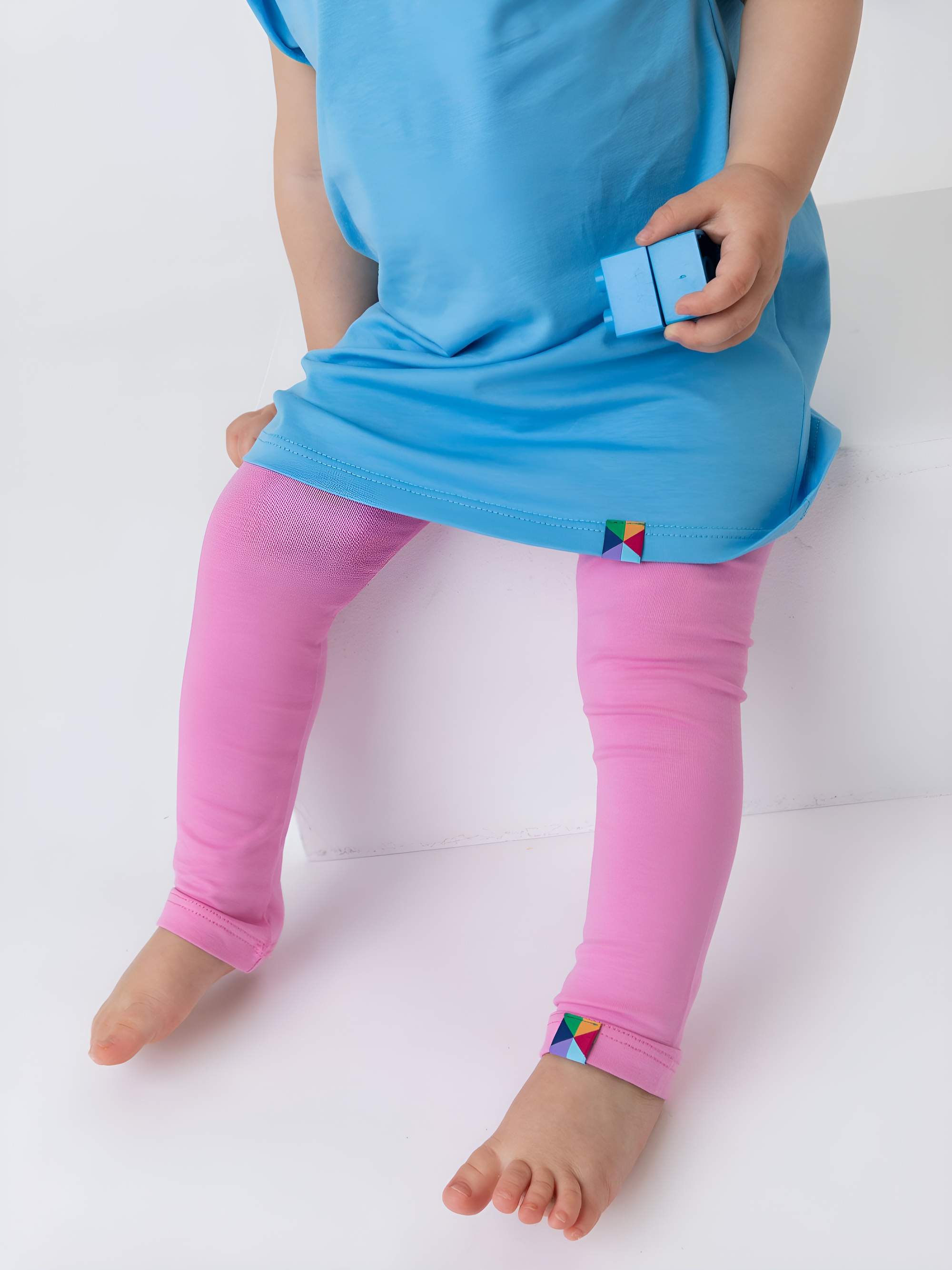 Pasteloworóżowe legginsy