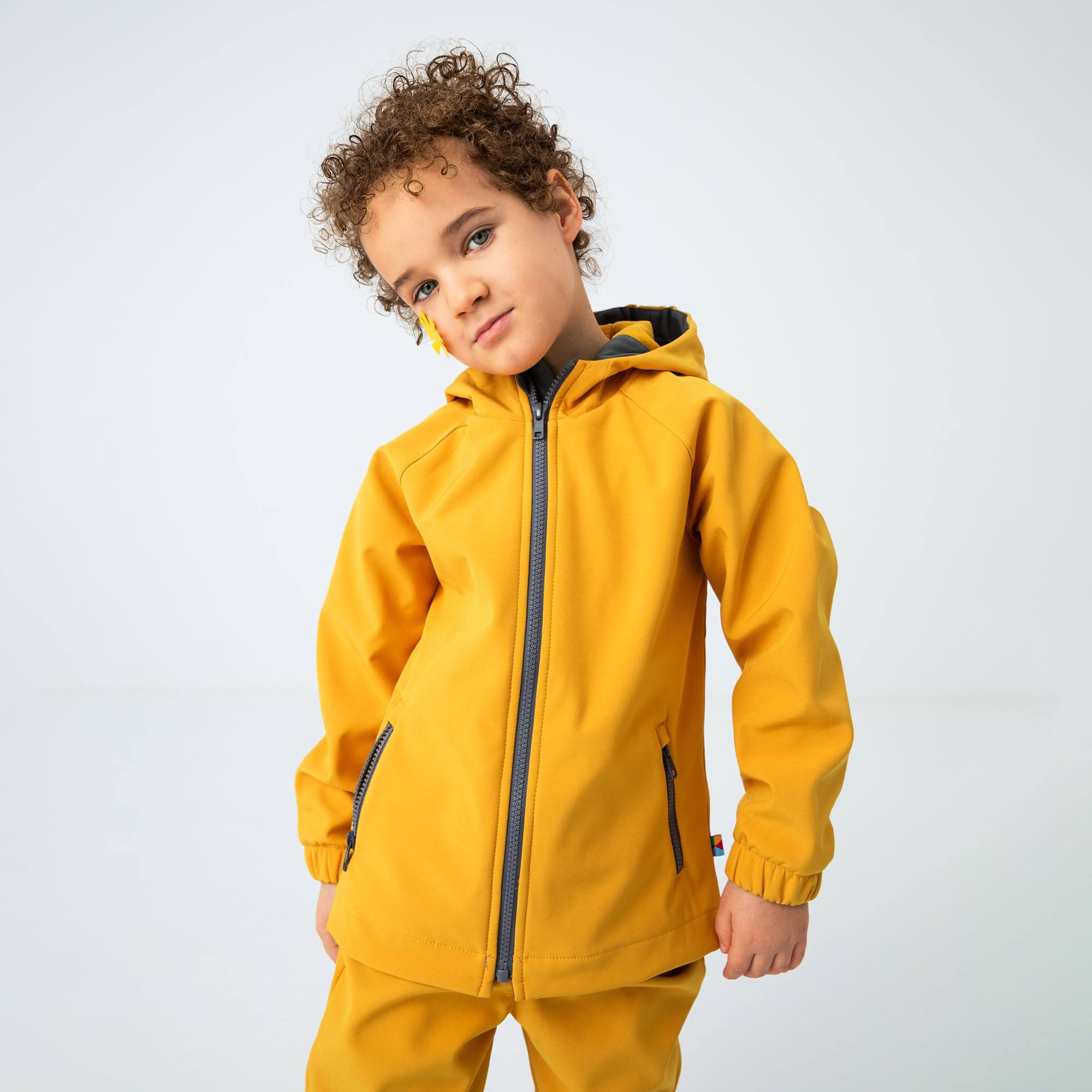 Musztardowa kurtka softshell