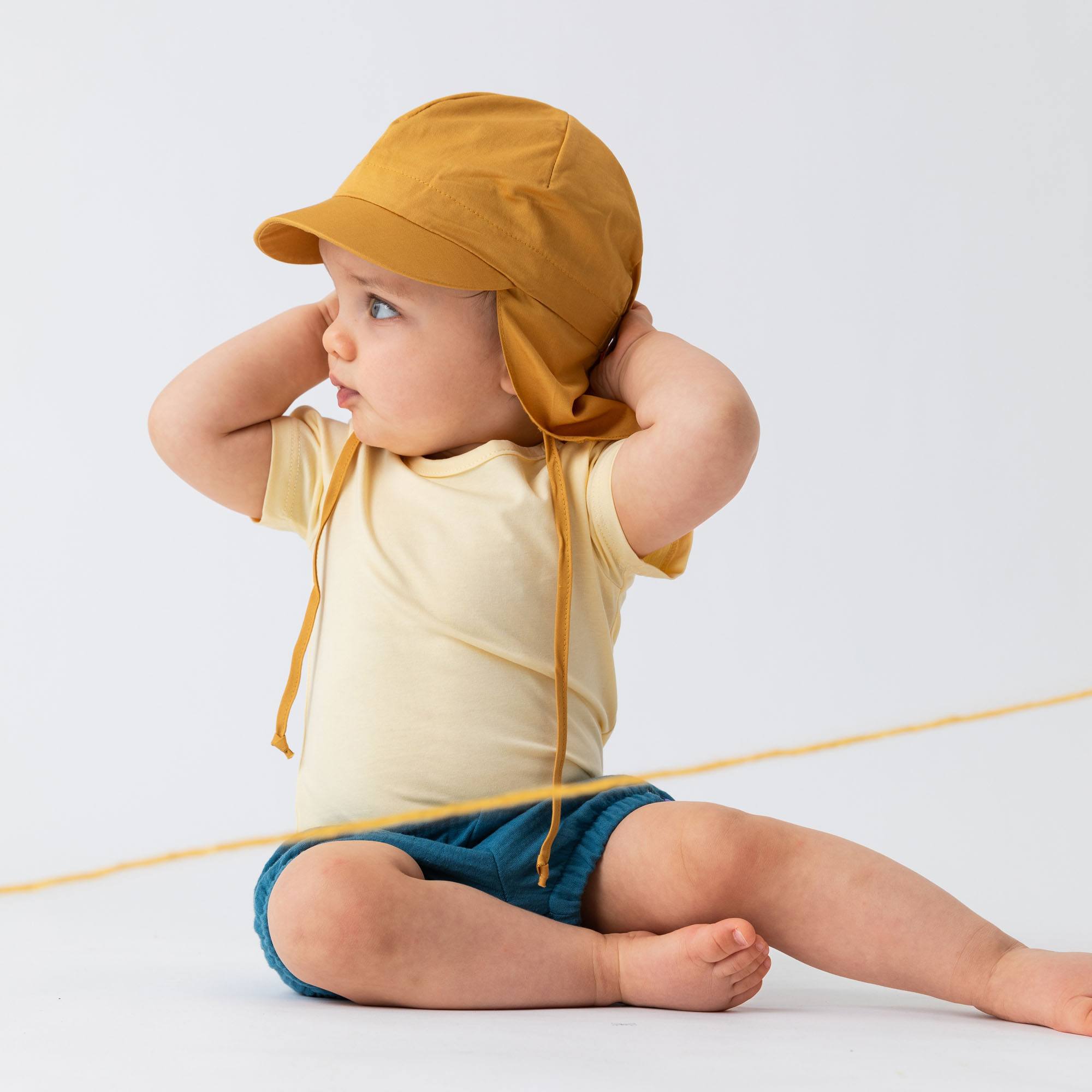 Musztardowa czapka z okapem 6-36 M