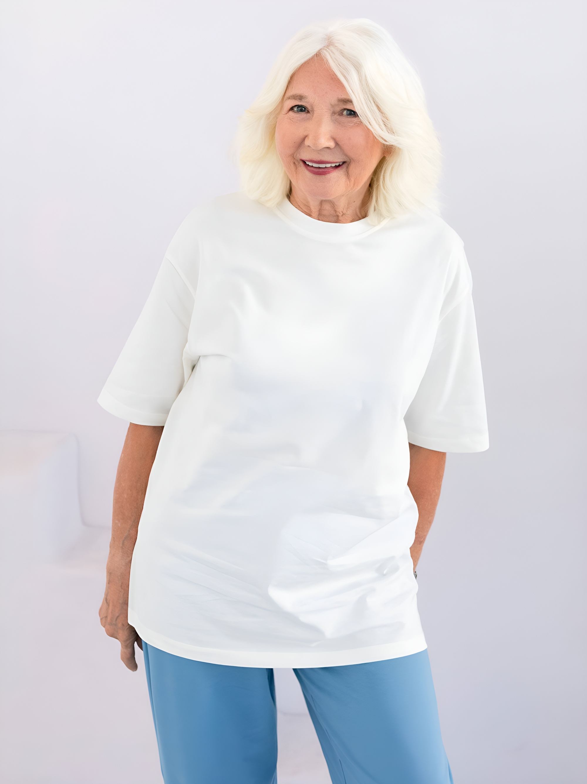 Śmietankowy T-shirt oversize damski