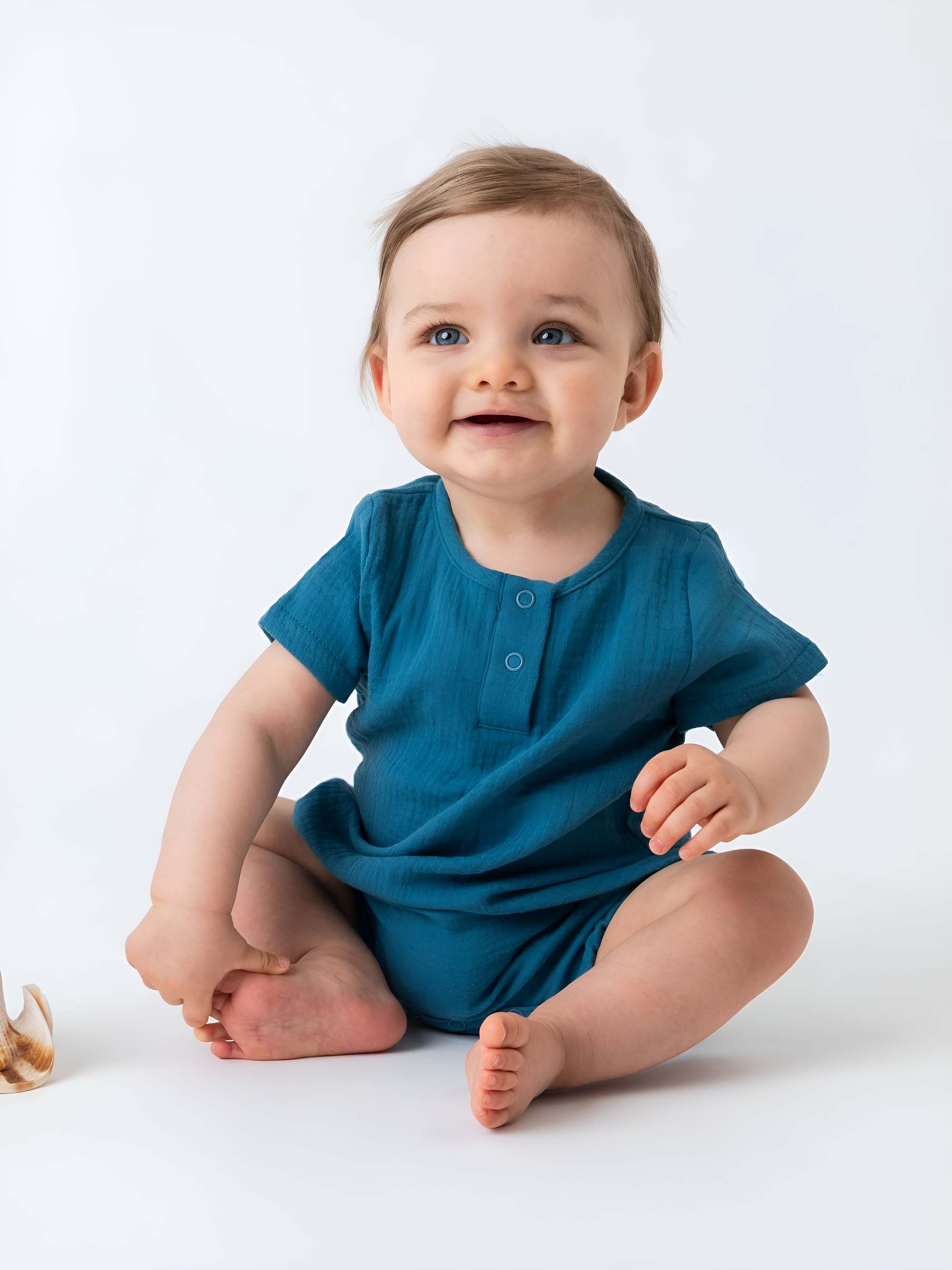 Blue muslin romper Baby