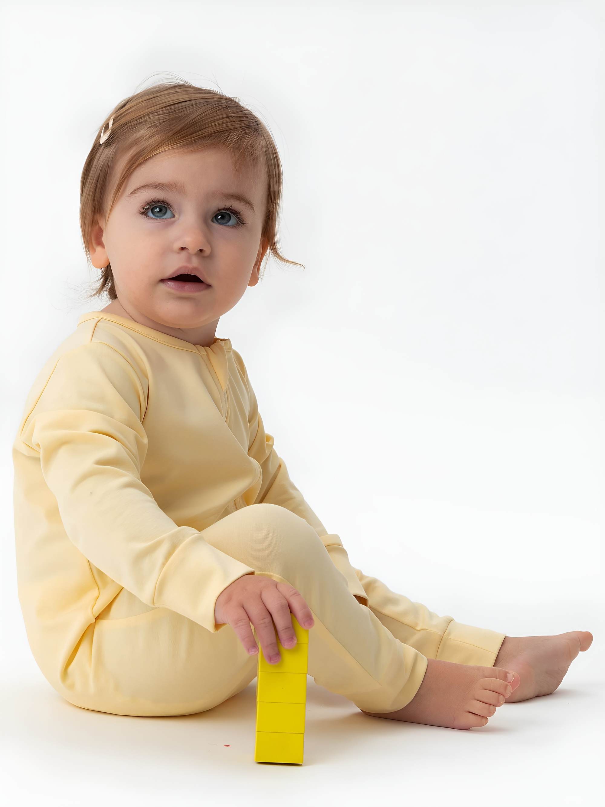 Light yellow romper suit