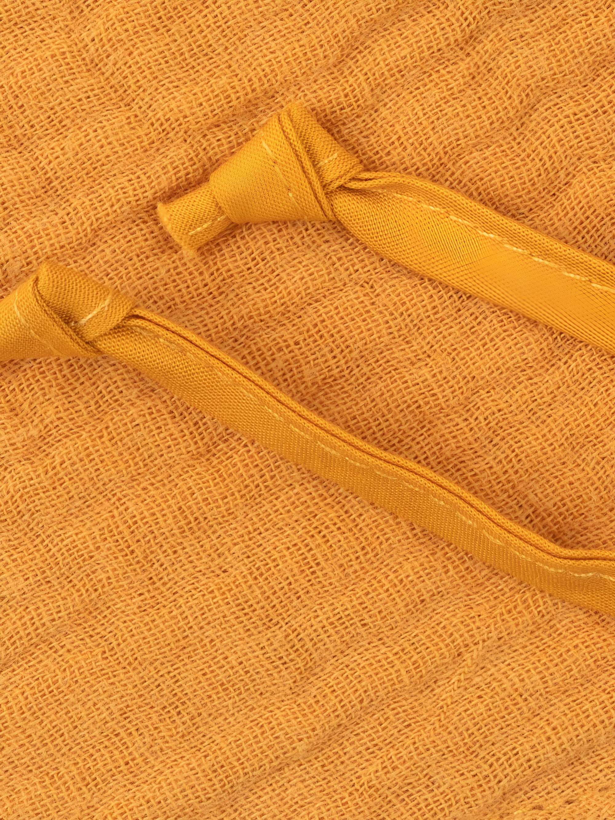 Mustard muslin hat with strings Baby