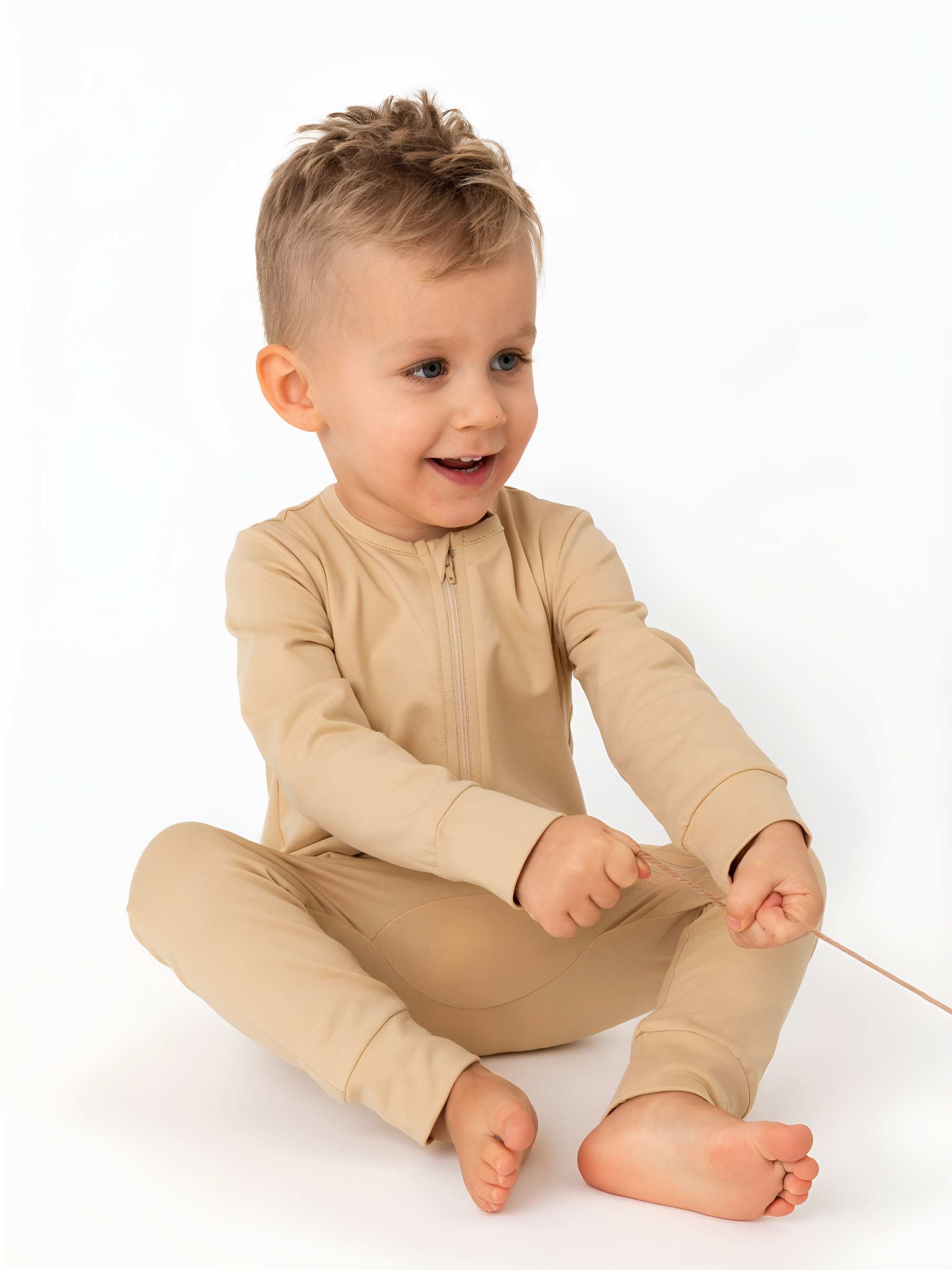 Beige romper suit