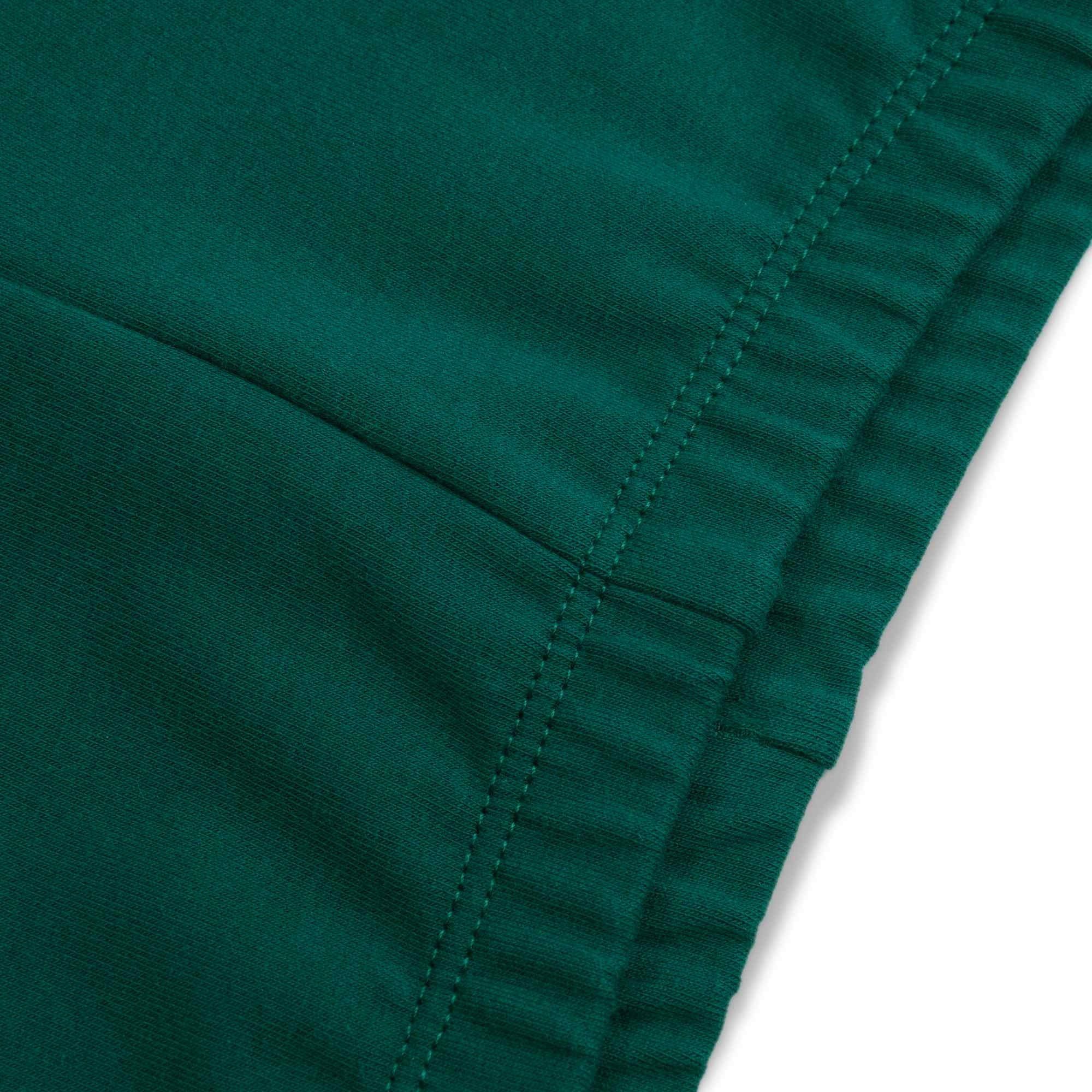 Butelkowozielone legginsy z meszkiem