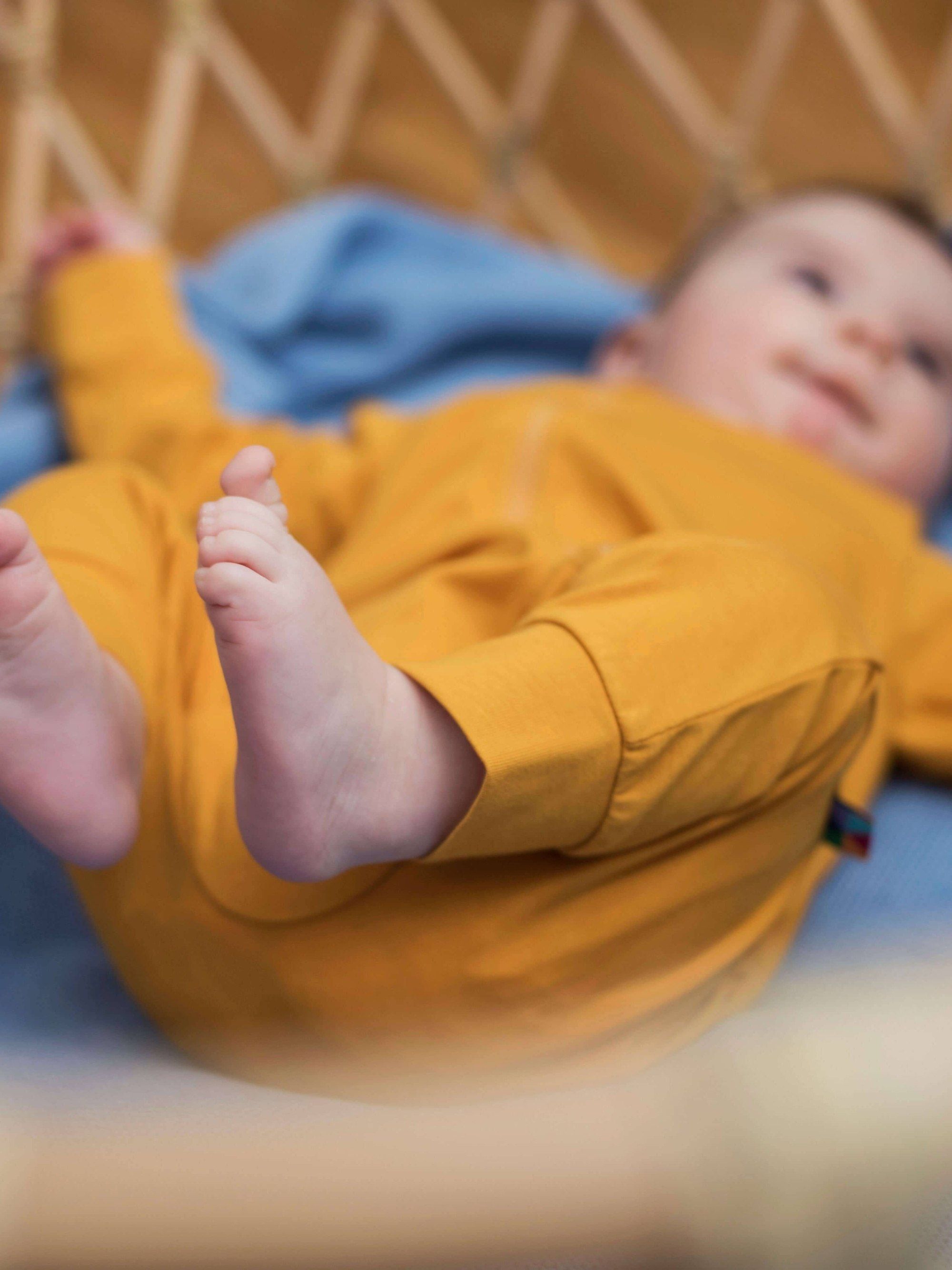 Mustard romper suit
